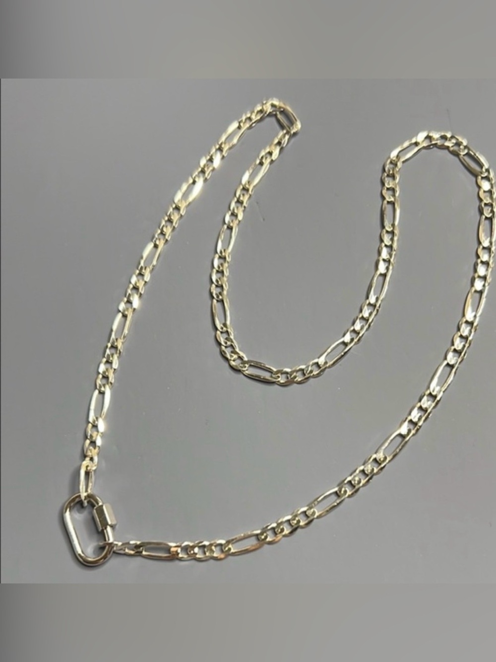 Aurate figaro chain necklace with link clasp that charms can be put on. ~17"